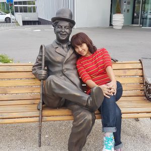 On a bench with Charlie Chaplin